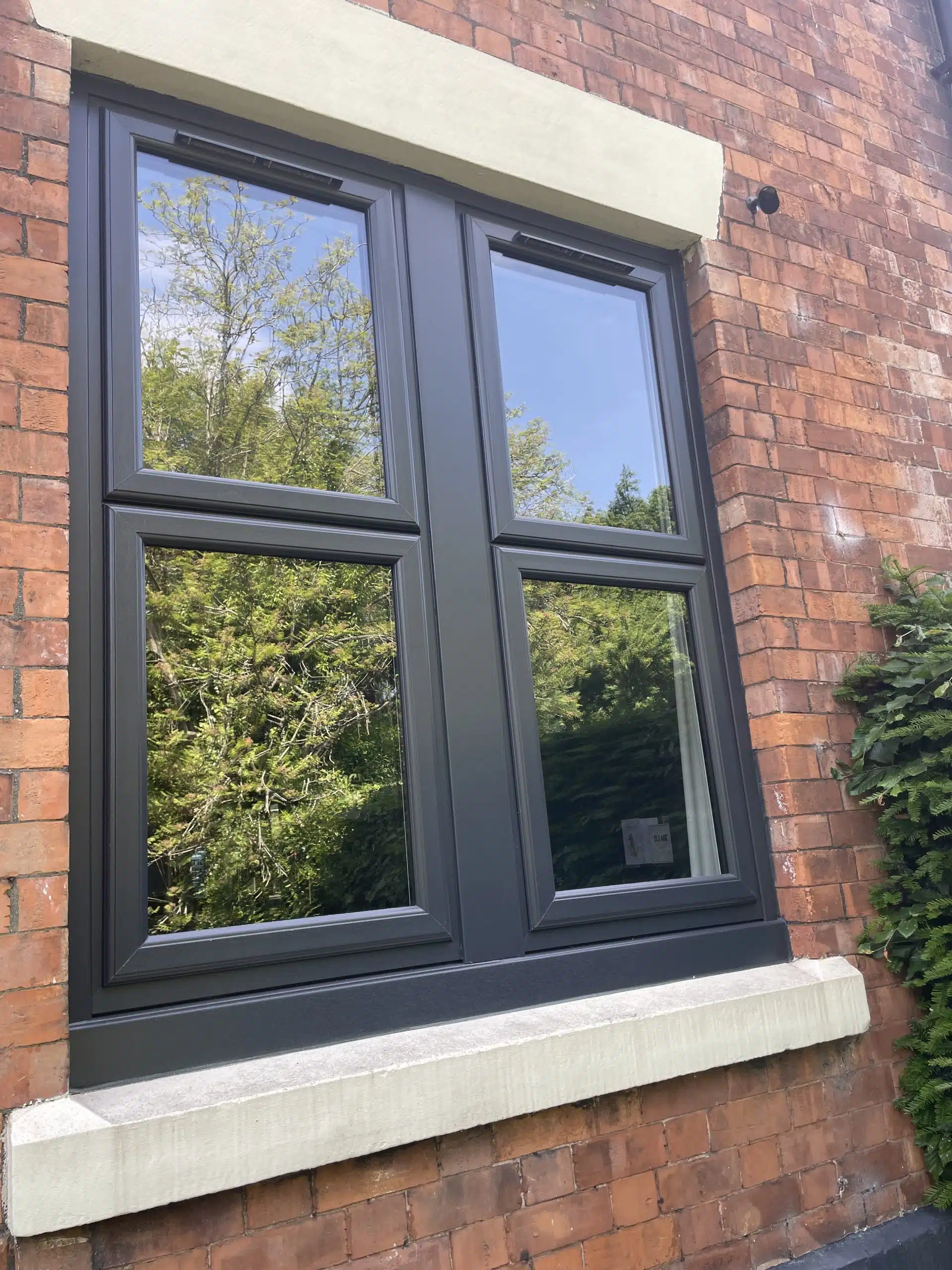 Modern uPVC windows in slate grey with multi-point locking